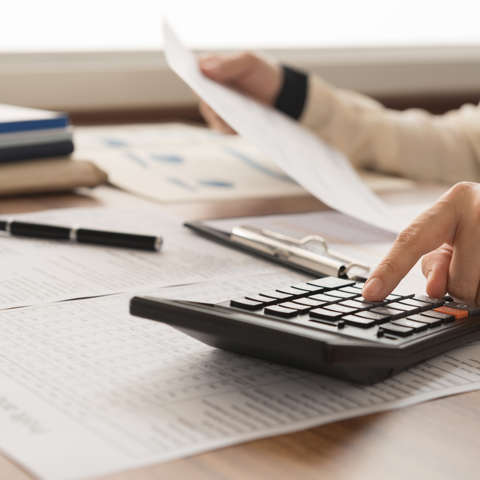 creating a small business energy budget on a calculator 